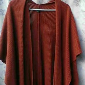 Poncho and necklace set.