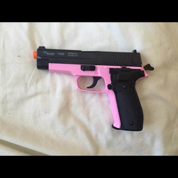 Pink and black Bebe gun