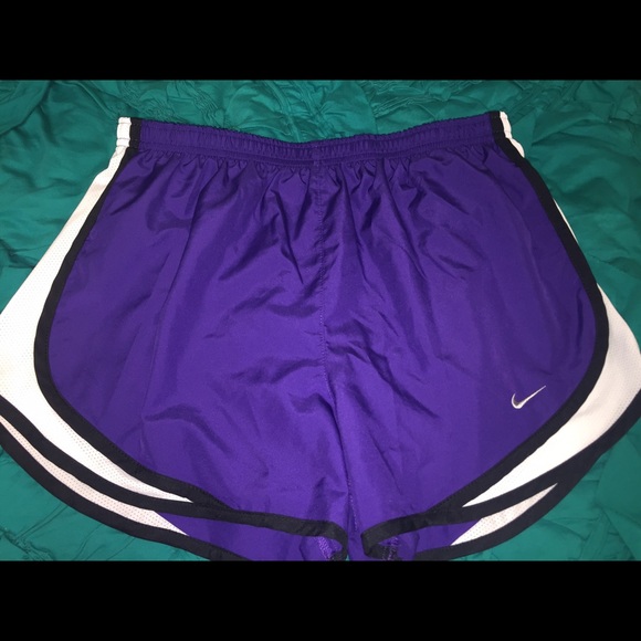 Purple Nike running shorts