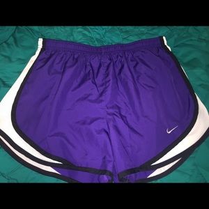 Purple Nike running shorts