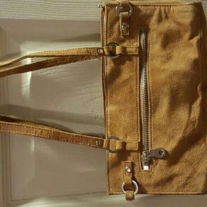 Small suede camel colored purse. Only used a few t
