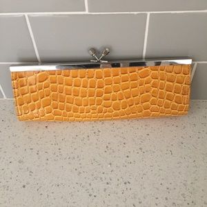 Canary yellow Nine West crocodile clutch