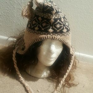 Creame and black knitted beanie cap