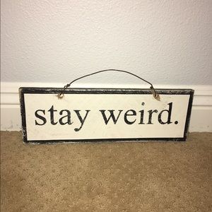 Brandy Melville stay weird sign