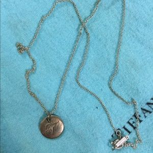 Tiffany and Co initial "T" necklace.