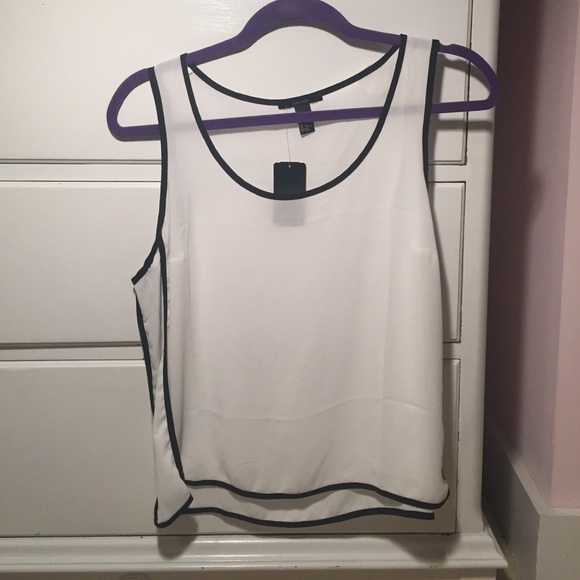 loose white and black tank top.