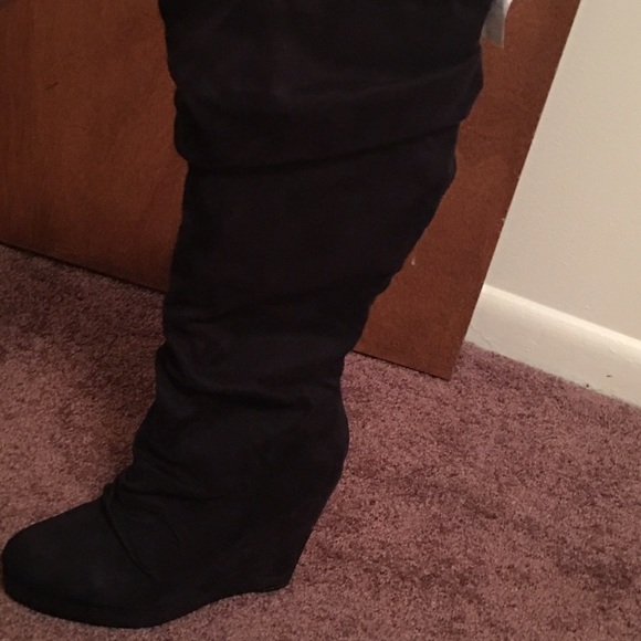 New never worn Black heeled wedges