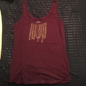 Purple and gold tank top.