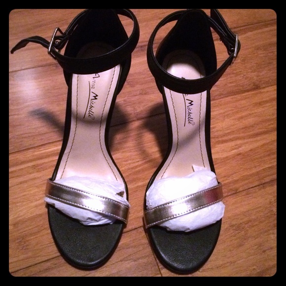 Cute black and gold ankle strap heels