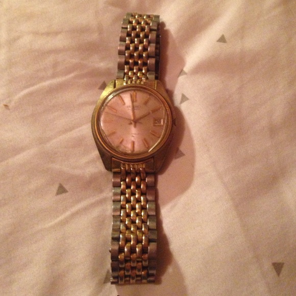 Antique silver and gold watch.