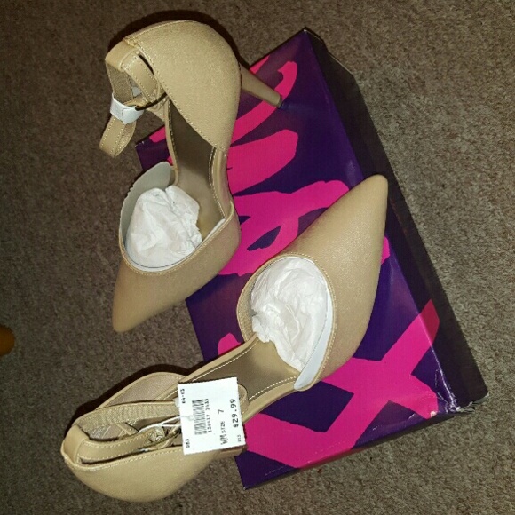 Brand new with tags beige pumps.