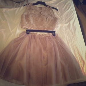 Two piece crop top and matching skirt.