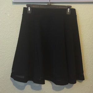 Black skirt with see through seem