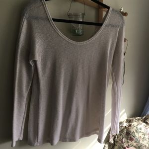 White sweater with bow on back