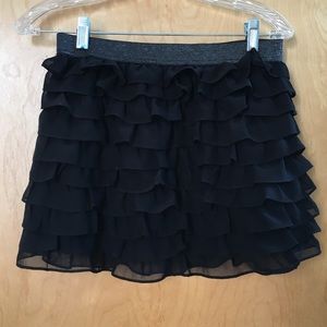 A ruffled skirt with sparkly waistband