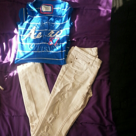 Ripped white skinnies and Areo shirt