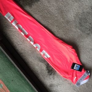 Brand new with tags hot pink Nike tights Size M