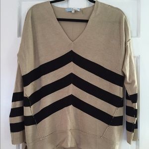 Tan and back sweater. ShopHopes