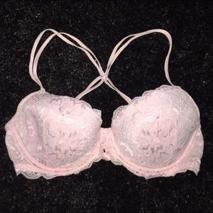 Pink bra , can clasp on back to make racerback