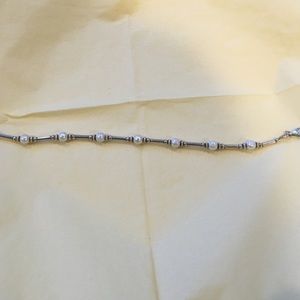 Sterling silver bracelet with pearls.