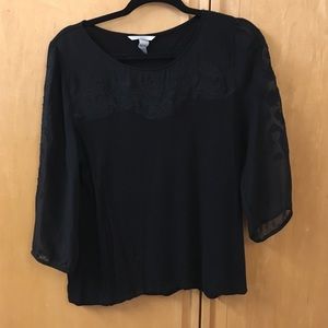 Black shirt with embroidered sleeves