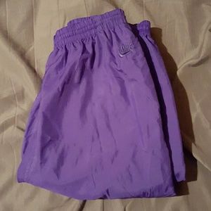 Purple Nike track pants