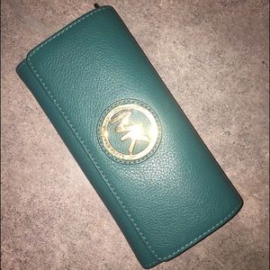 SOLD Authentic teal Michael Kors wallet
