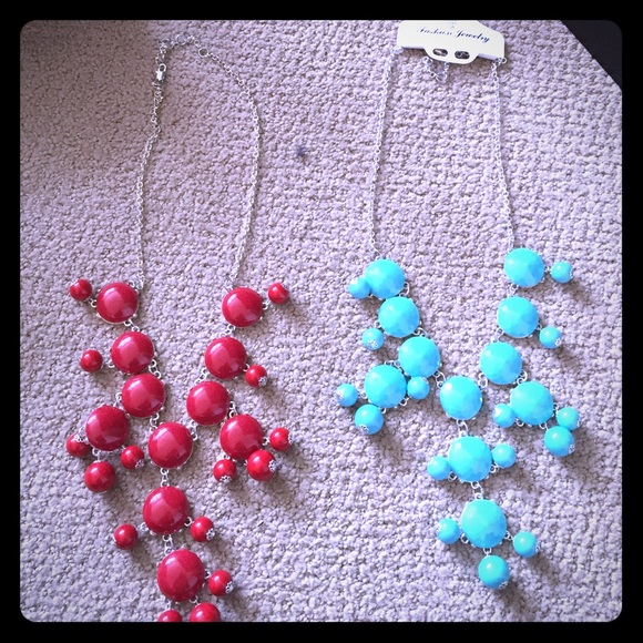 Two statement necklaces, red and turquoise