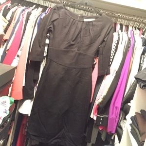 Trina Turk black 3/4 sleeve dress. below knee.