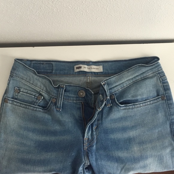Levi 524 light wash stretch skinny jeans