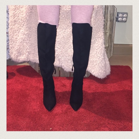 Black above the knee boots