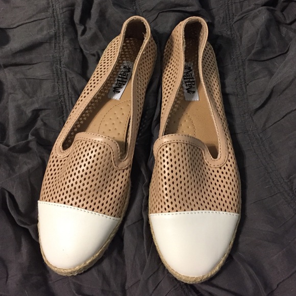Tan and white loafers