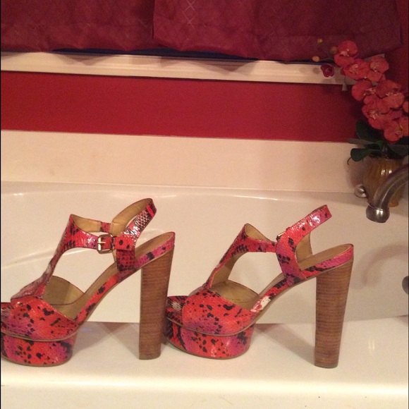 Red snake print heels