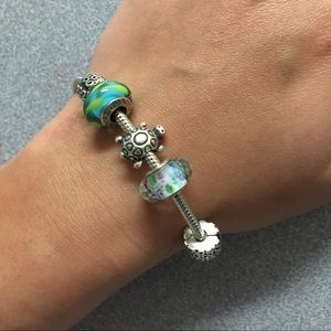 Pandora Bracelet with 3 pandora charms