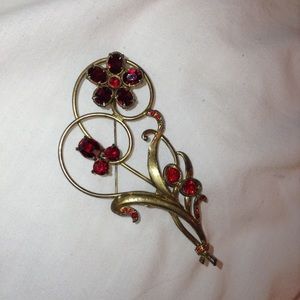 Gold-tone, Red Stone brooch.