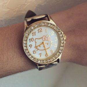 Hello kitty watch with cheetah design.