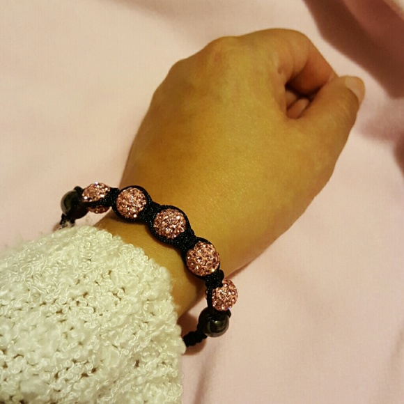 Never worn pink & black adjustable bracelet