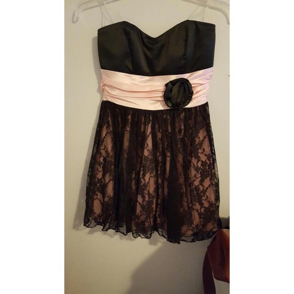 Black and pink lace dress with flower detail