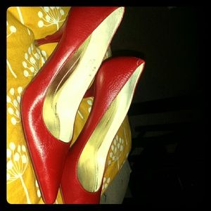 Flaming red leather Coach heels