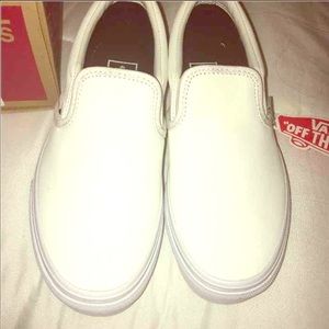 White leather Vans slipons