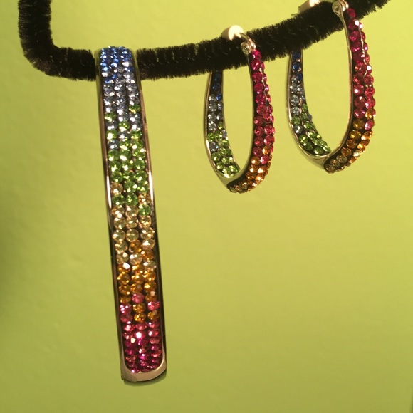 Stainless steel bangle bracelet and earrings.
