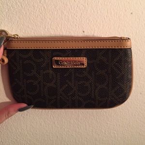 Calvin Klein monogram wristlet.