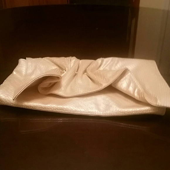 Chinese Laundry faux snakeskin pierced clutch