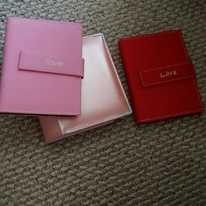 3 small photo albums