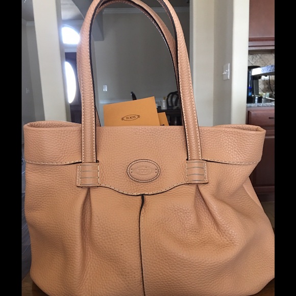 Authentic notice T.O.D.S. Purse