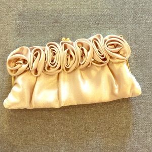 New gold flower clutch with optional strap.