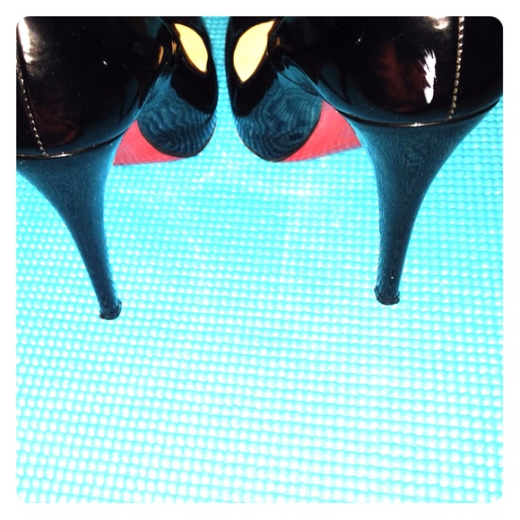 Louboutins, intact exterior, treated & waterproof