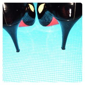 Louboutins, intact exterior, treated & waterproof