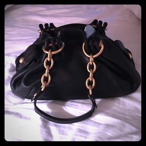 Black leather Juicy Couture purse with gold detail