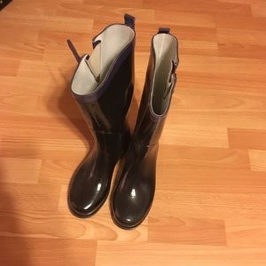Black knee high rain boots